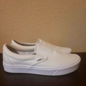 White slip on Vans
